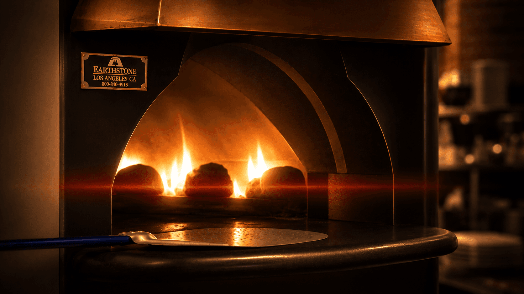 The pizza oven fire glaring