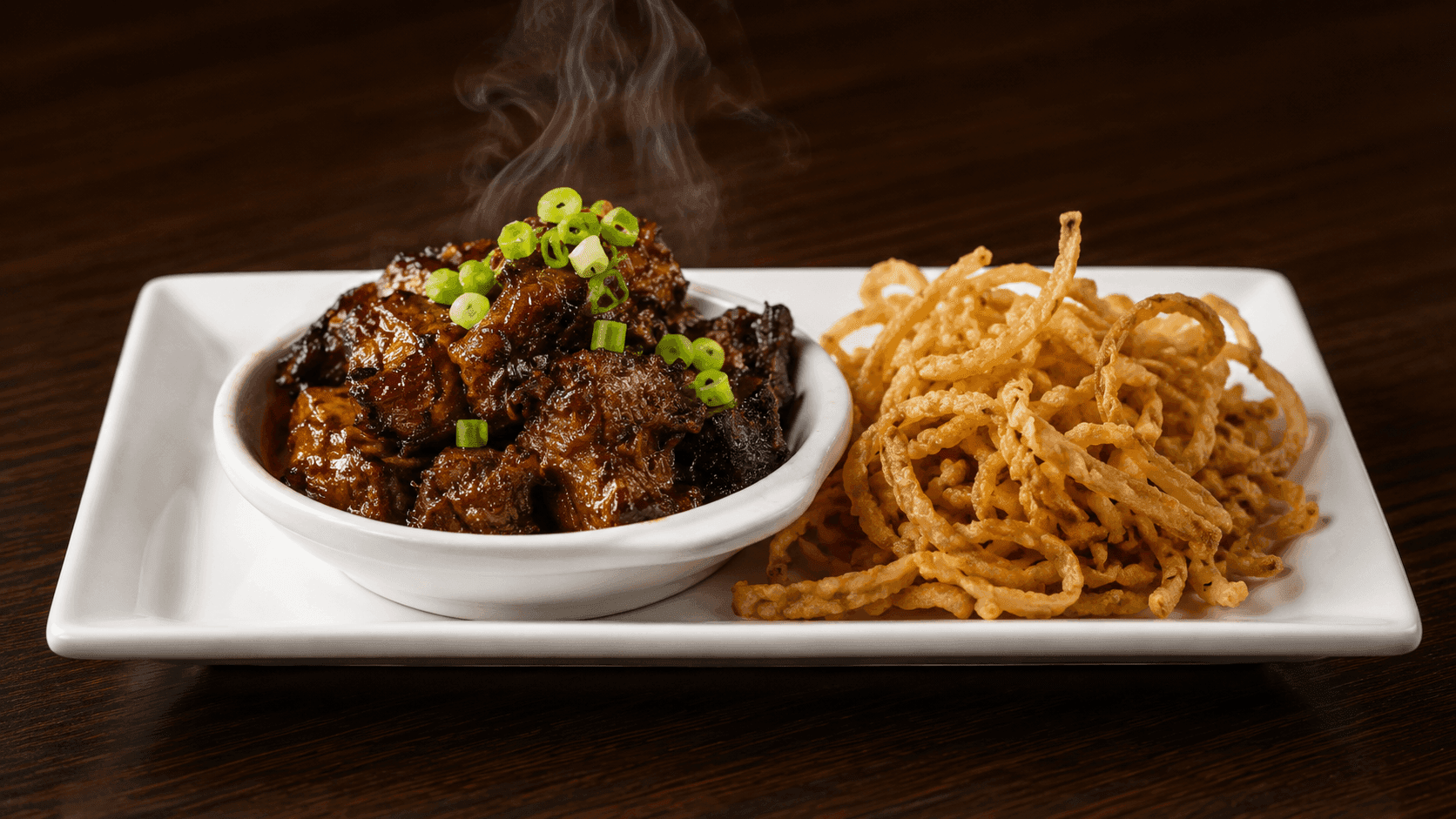 Burnt ends with onion straws