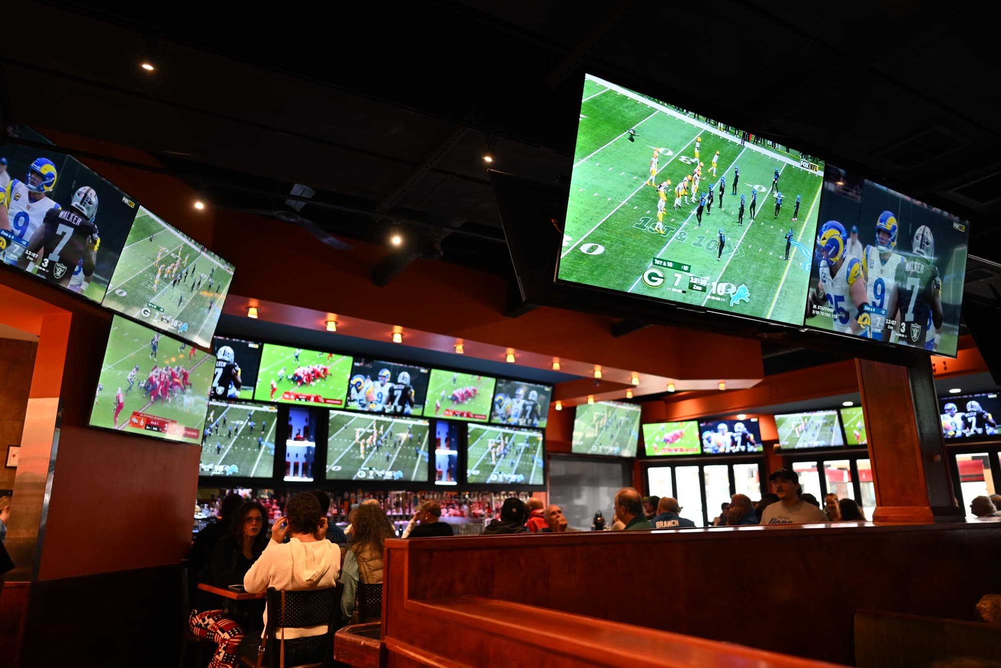 Game on the TVs above the bar